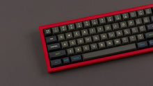 Load image into Gallery viewer, MTNU Susu on a red keyboard zoomed in on left