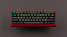 Load image into Gallery viewer, MTNU Susu on a red keyboard