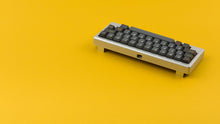 Load image into Gallery viewer, GMK Oblivion V3.1 on a silver keyboard angled back