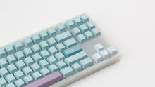 Load image into Gallery viewer, Key kobo Glacier on a translucent NK87 zoomed in on right