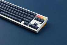 Load image into Gallery viewer, KAT Dark Milkshake on a white and yellow keyboard zoomed in on right