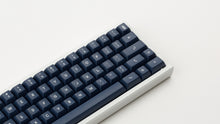 Load image into Gallery viewer, KAT Milkshake Dark Base Kit on a white keyboard zoomed in on right