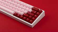 Load image into Gallery viewer, Key Kobo Darling on a white keyboard zoomed in right