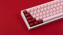 Load image into Gallery viewer, Key Kobo Darling on a white keyboard zoomed in left