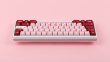 Load image into Gallery viewer, Key Kobo Darling on a white keyboard centered back