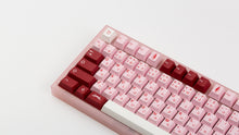 Load image into Gallery viewer, Key Kobo Darling on an NK87 Blossom zoomed in left