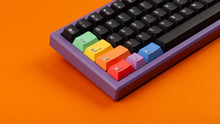Load image into Gallery viewer, Keycapsule Prism dark on a purple keyboard close up on left side