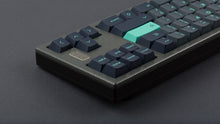Load image into Gallery viewer, Key Kobo Abyss on a dark grey hammered texture keyboard back view right side