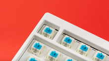 Load image into Gallery viewer, Keycult No. 1 / 1800 Darling White Edition close up on top left side with NovelKeys Classic Blue Switches
