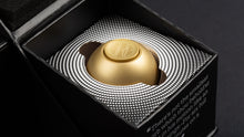 Load image into Gallery viewer, brass orb inside packaging