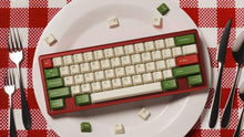 Load image into Gallery viewer, Render of DCS Cream Cheese R3 keycaps on black keyboard with brass weight, angled view