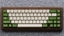 Load image into Gallery viewer, Render of DCS Cream Cheese R3 keycaps on beige keyboard, warm lighting wide shot