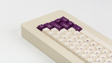 Load image into Gallery viewer, Key Kobo VoC on a beige keyboard back view right side
