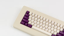 Load image into Gallery viewer, Key Kobo VoC on a beige keyboard zoomed in on left