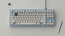Load image into Gallery viewer, Render of a GMK 2Pack heart-2 keycap on a blue TKL keyboard