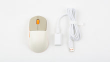 Load image into Gallery viewer, NK-M1 beige mouse next to its white USB receiver and braided charging cable