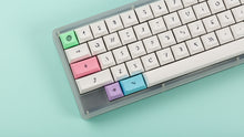 Load image into Gallery viewer, DSA Milkshake on a clear keyboard zoomed in left