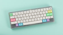 Load image into Gallery viewer, DSA Milkshake on a clear keyboard angled