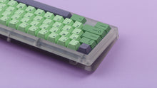Load image into Gallery viewer, GMK CYL Zooted on a translucent keyboard back view