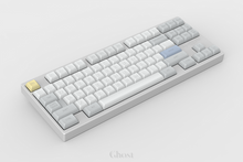 Load image into Gallery viewer, KAM Ghost on a white keyboard angled left