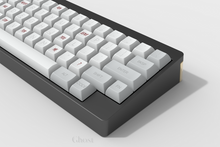 Load image into Gallery viewer, KAM Ghost on a black keyboard zoomed in right