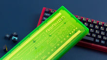 Load image into Gallery viewer, pink and green cases case featuring awaken keycaps bottom view of green
