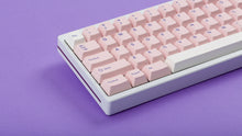 Load image into Gallery viewer, Cherry Blossom on a white keyboard zoomed in left 