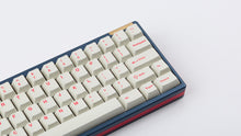 Load image into Gallery viewer, Cherry Ember on a blue and red keyboard zoomed in right