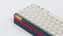 Load image into Gallery viewer, Cherry Ember on a blue and red keyboard zoomed in right back
