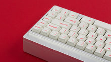 Load image into Gallery viewer, Cherry Ember on a silver keyboard zoomed in right back