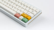 Load image into Gallery viewer, Key Kobo BoW on a white keyboard zoomed in on the right