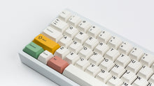 Load image into Gallery viewer, Key Kobo BoW on a white keyboard zoomed in on the left