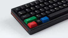 Load image into Gallery viewer, Key Kobo WoB on a black keyboard zoomed in on left