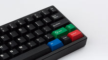 Load image into Gallery viewer, Key Kobo WoB on a black keyboard zoomed in on right