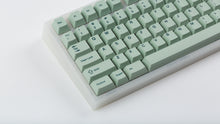 Load image into Gallery viewer, Cherry Sage on a translucent NK87 zoomed in on the left