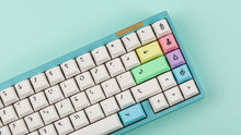 Load image into Gallery viewer, Cherry Milkshake on a blue keyboard zoomed in right