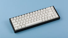 Load image into Gallery viewer, Cherry Milkshake on a black keyboard angled