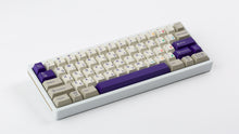 Load image into Gallery viewer, Cherry Spellbook on a white keyboard angled