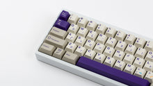 Load image into Gallery viewer, Cherry Spellbook on a white keyboard zoomed in on left