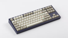 Load image into Gallery viewer, Cherry Spellbook on a purple NK87 keyboard angled