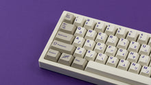 Load image into Gallery viewer, Cherry Spellbook on a white keyboard zoomed in on left
