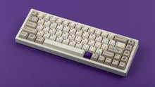 Load image into Gallery viewer, Cherry Spellbook on a white keyboard angled