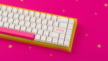Load image into Gallery viewer, yellow tfue edition case with keycaps on tfue deskpad