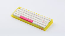 Load image into Gallery viewer, yellow tfue edition case with keycaps angled
