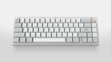 Load image into Gallery viewer, KAM Ghost on a clear keyboard centered