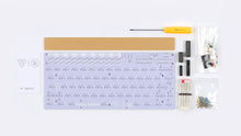 Load image into Gallery viewer, top down shot of the components included in the kit