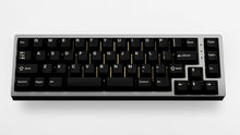 Load image into Gallery viewer, CYL WoB Extensions on a silver keyboard centered